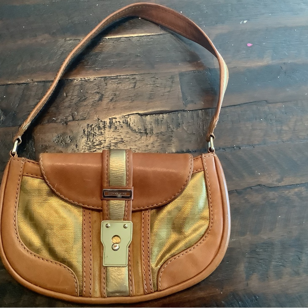 Michael Kors tan and gold small bag.